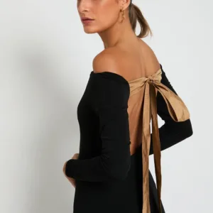 Vestido Adelia en punto con manga y lazo de tafetán en la espalda.